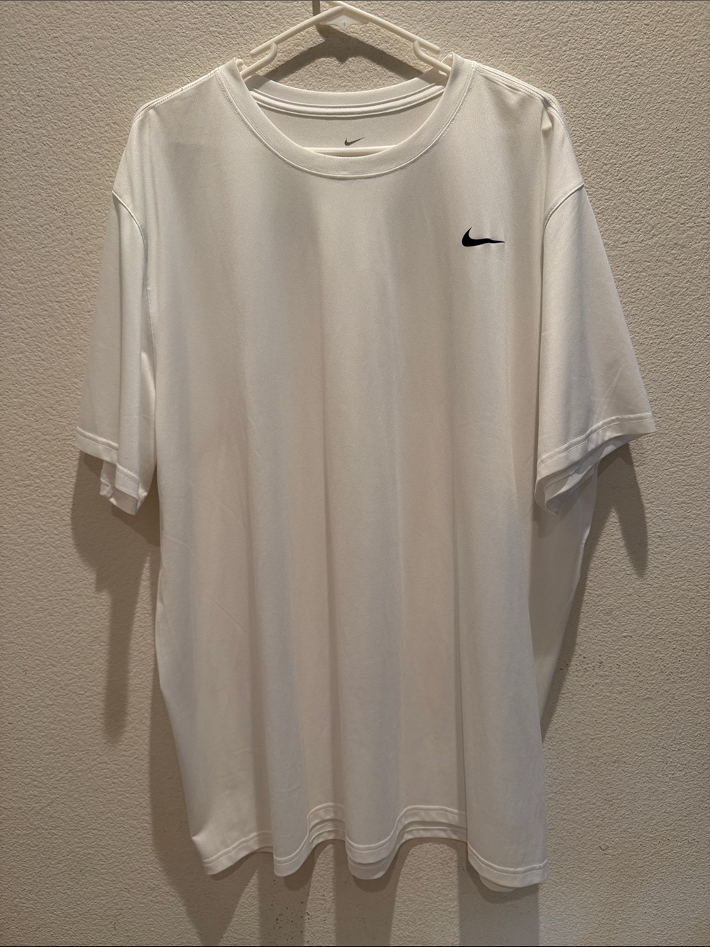 Nike White Short Sleeve Performance Tee with Black Swoosh